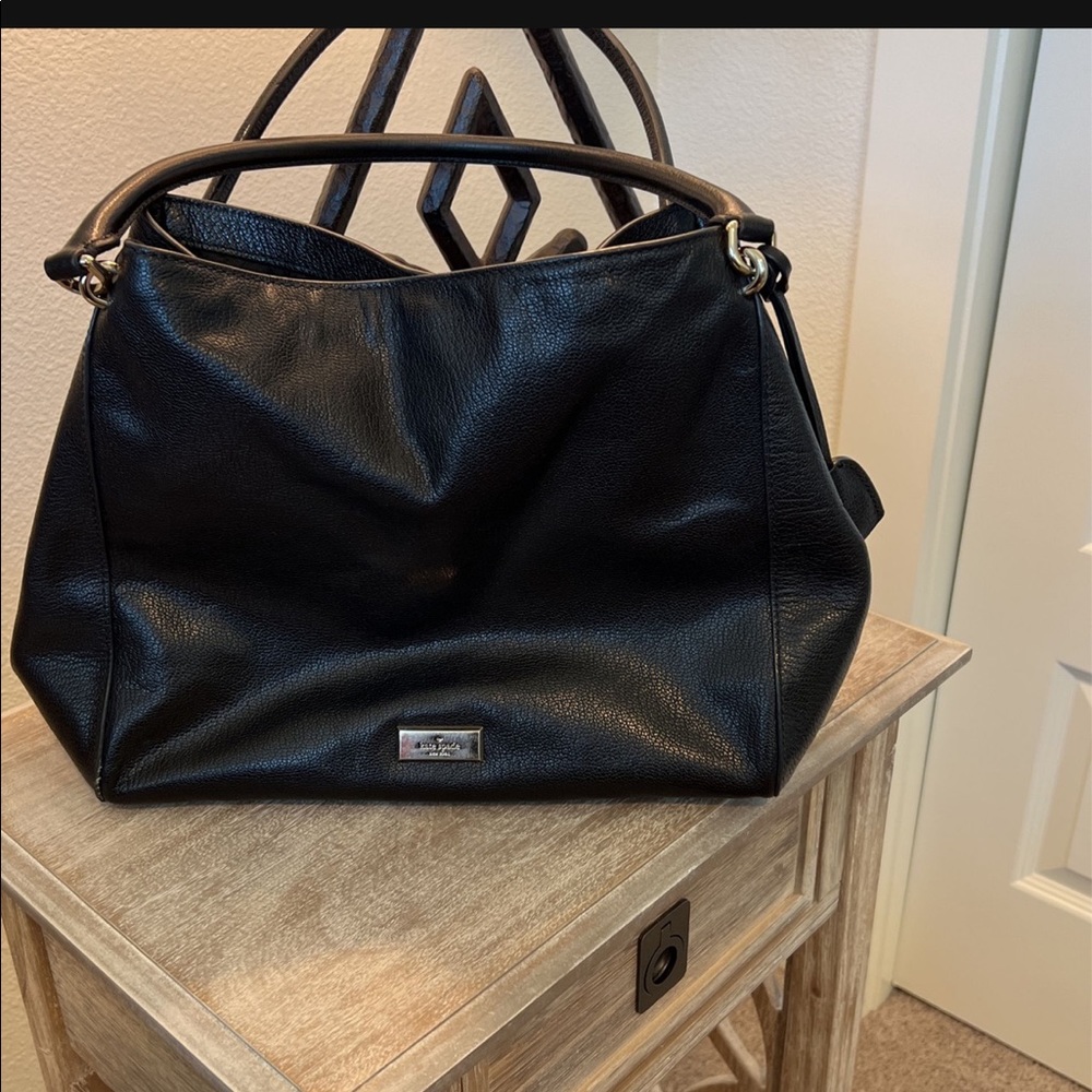 Black Med size Kate Spade Hand Bag lots of life left to bring someone joy